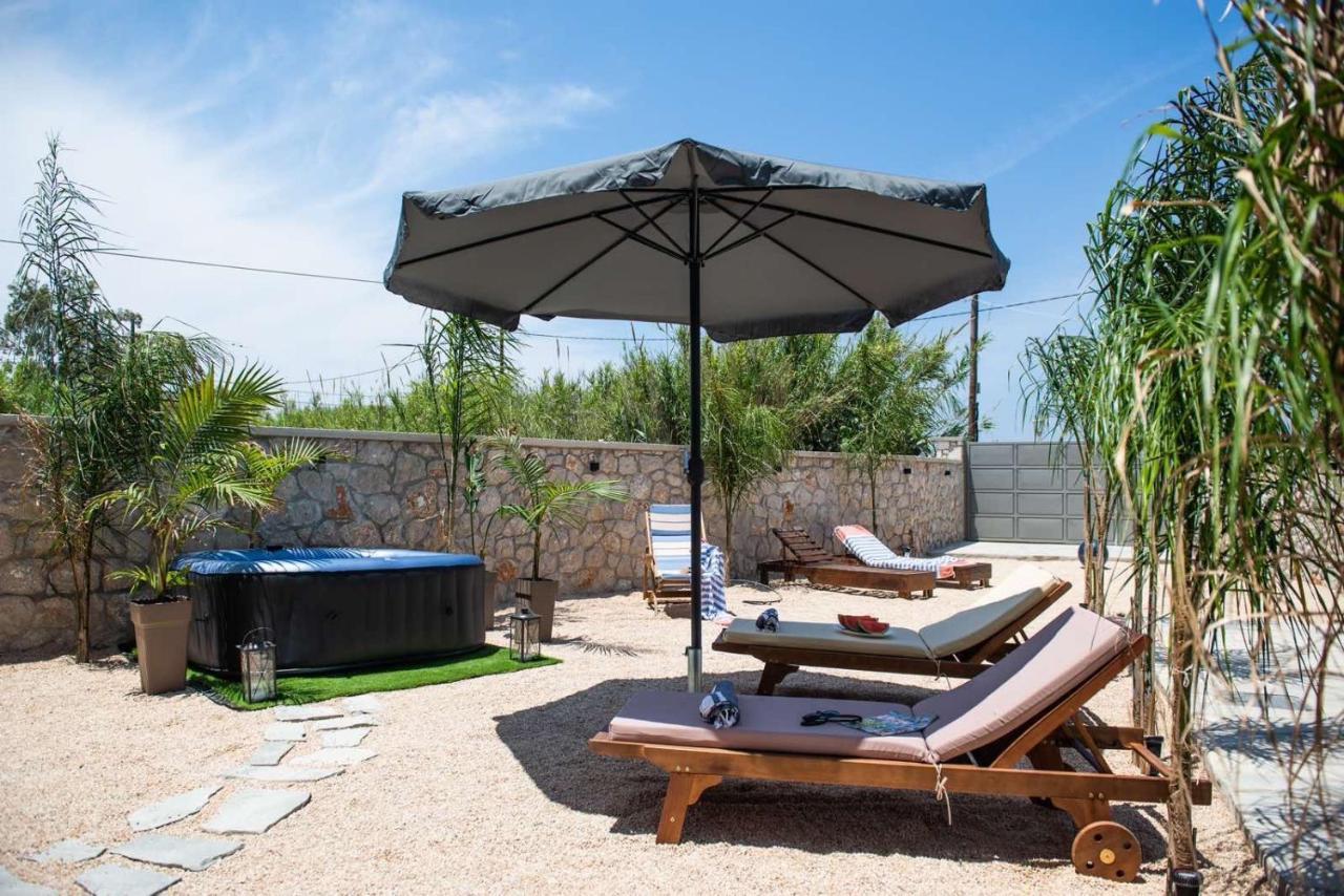 Odyssea Top View & Hot Jacuzzi Front Beach Kremasti  Bagian luar foto